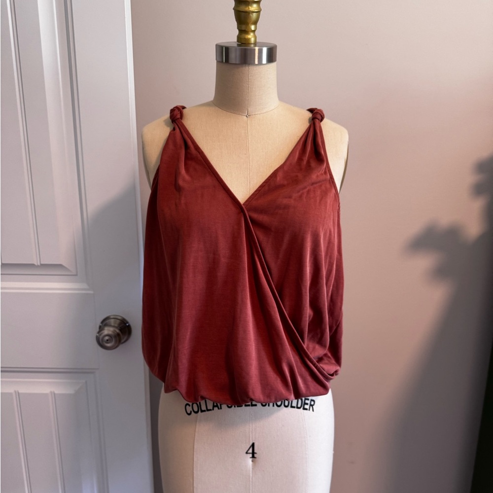 Rust colored sleeveless top